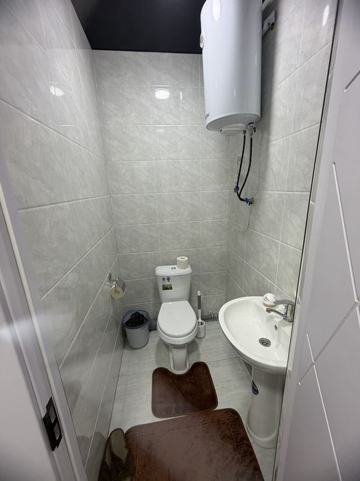 4 - мавзе йул буйидаги янги дом. 5 етаж 3 хона