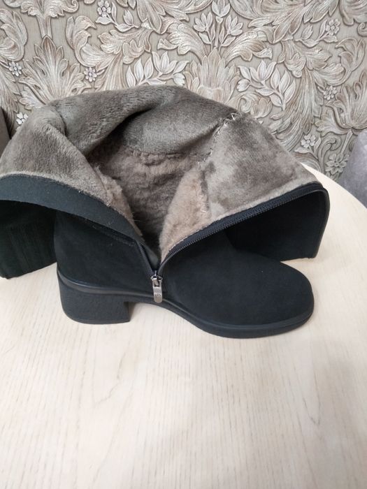 Продам зимние сапоги.Новые.