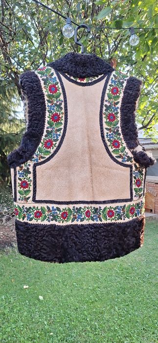 Bundita prim miel irhă boanda bondiţă
tradițională bunda vesta piele