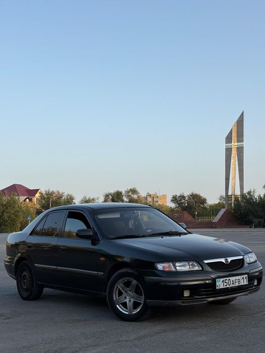 Мазда 626 птичка