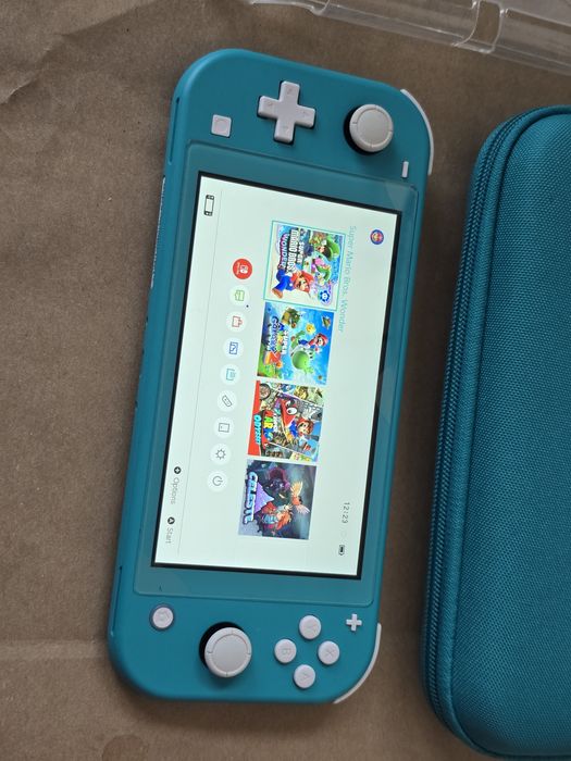 Nintendo Switch Lite Turquoise + 64гб карта памет + PicoFly
