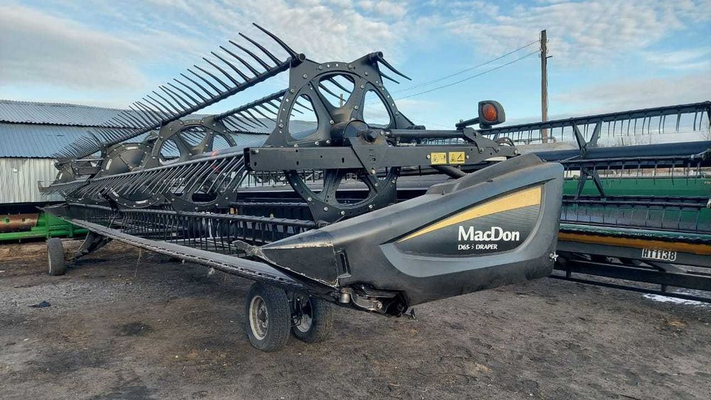 комбайн Claas Lexion 670 .