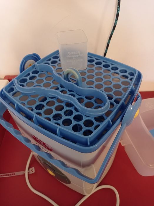 Sterilizator electric cu aburi pentru biberoane - Primii Pasi