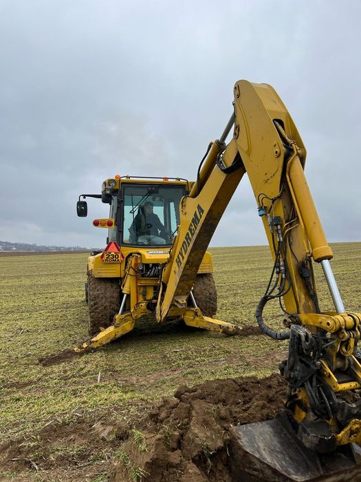 Ofer servicii cu buldoexcavator, săpături, amenajări, demolări