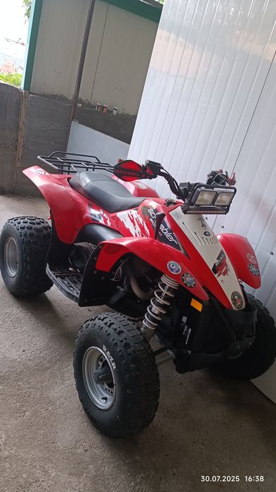 Поменяю квадроцикл Polaris Scramble 500 см³ на автомобиль