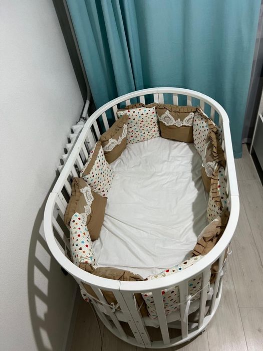 Детскоя кроватка трансформер с маятником