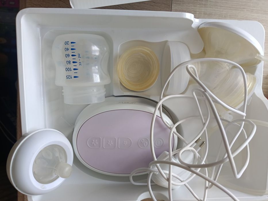 Электрический молокоотсос