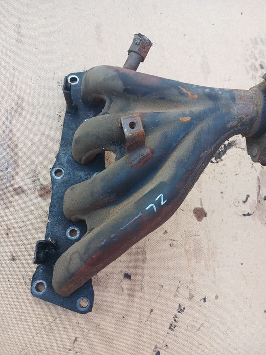 Коллектор Мазда 323 двигатель ZL