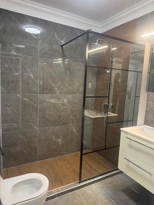 Apartament de închiriat în bloc nou cu garaj subteran direct e la prop