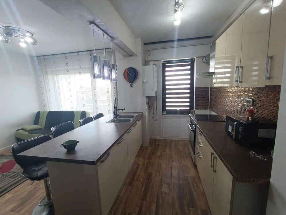 Apartament cu loc de parcare subteran - Royal Town Copou