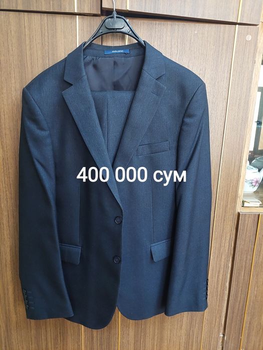 Сотилади костюм буруг  иктаси янги иктаси кийилган