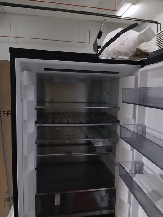 Холодильник новый но поврежден