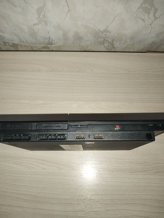 Продам playstation 2 + 64 mb memory card
