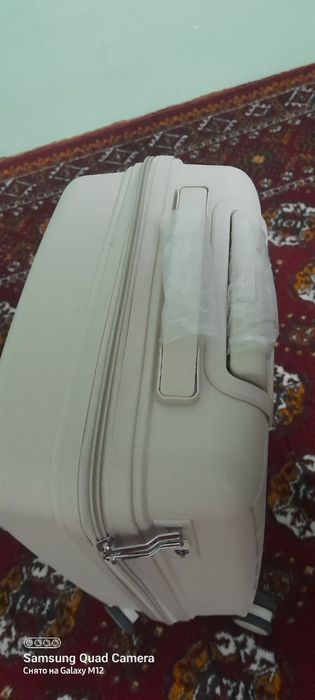 Tozo ishlatilmagan chamadon