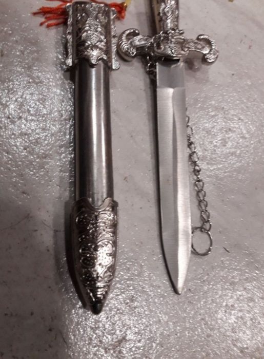 Срасив синжал,нож,кортик кама