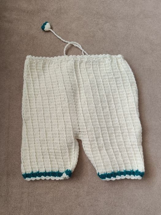 Плетени бебешки дрехи