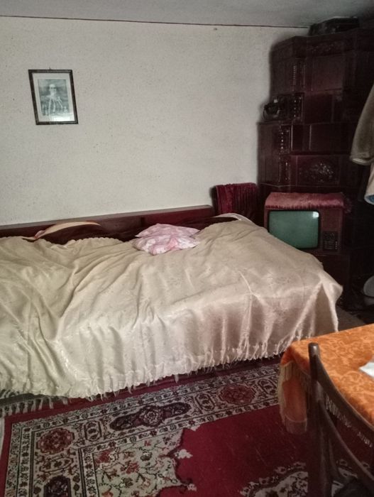 Casa bătrânească și teren Malul cu Flori