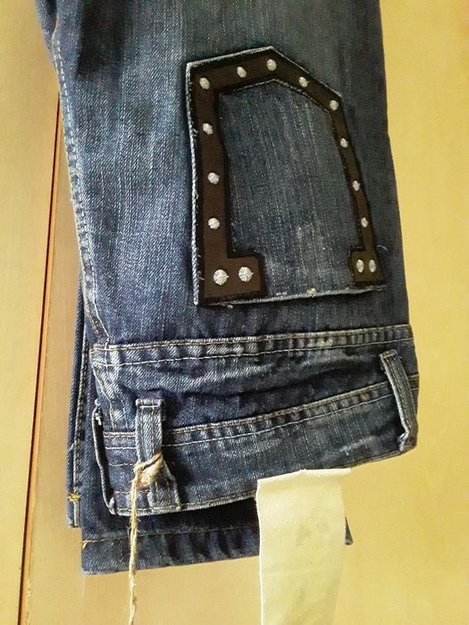 Новые джинсы с этикеткой