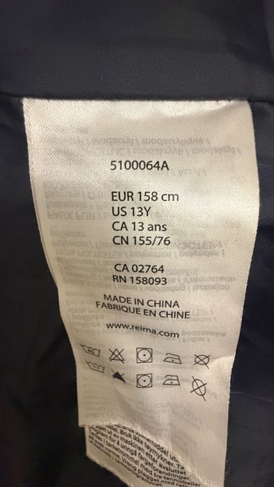 Продам пуховик Reima