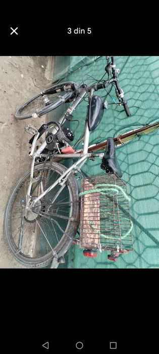 Bicicleta cu motor 2 timpi