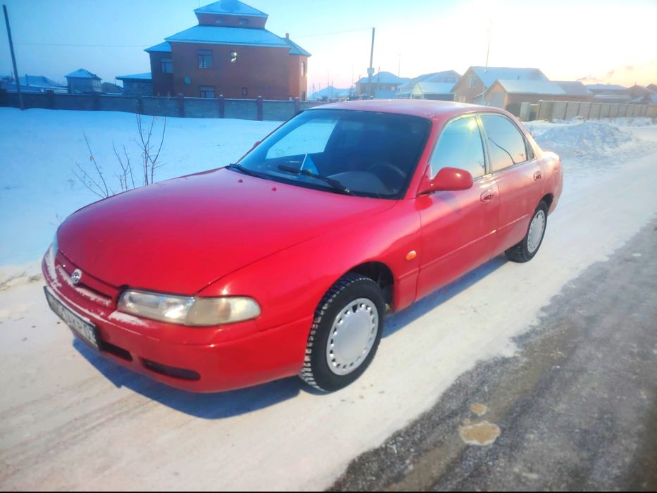 Мазда кронус на ходу.