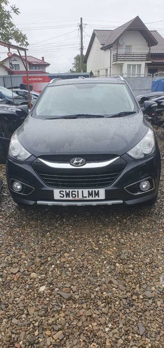 Dezmembrez Hyundai ix35 motor 1.7 crdi tip D4FD 136 cp an 2012 broasca portiera stanga dreapta fata spate debitmetru aer carcasa filtru aer timonerie