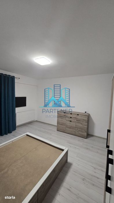 Apartament 1 camera + loc de parcare mobilat+utilat Bucium-Visan,liber