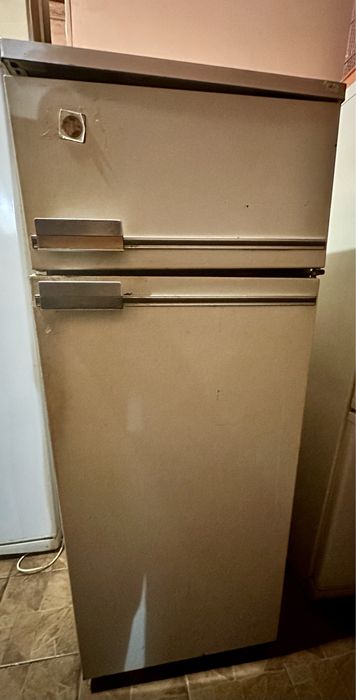 Дарю холодильник