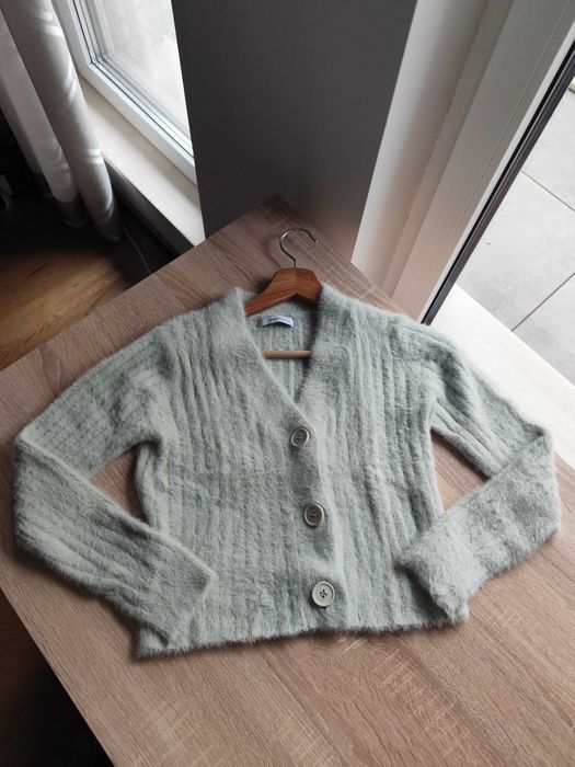 Пухкава плетена жилетка Reserved