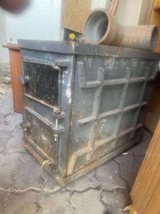 Новый Печь чугунный