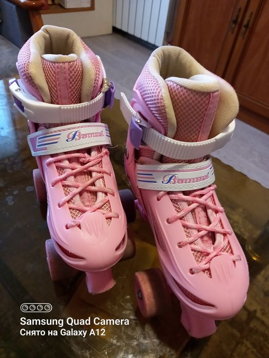 Роликовые коньки
