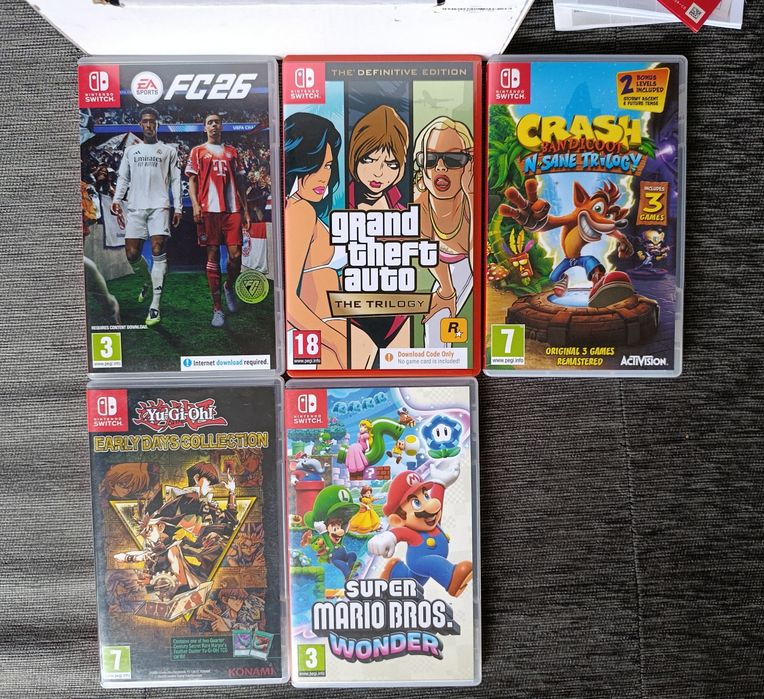 Nintendo Switch Lite + 9 игри