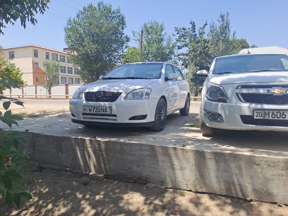 Тайота королла 2002