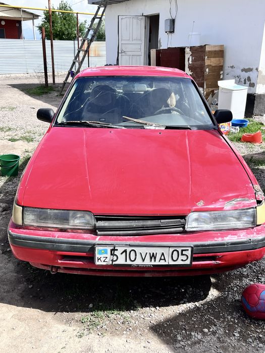 Машина Mazda 626