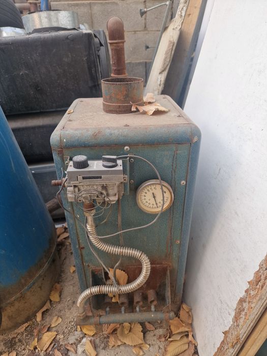 Продам газовую/угольнуь печь