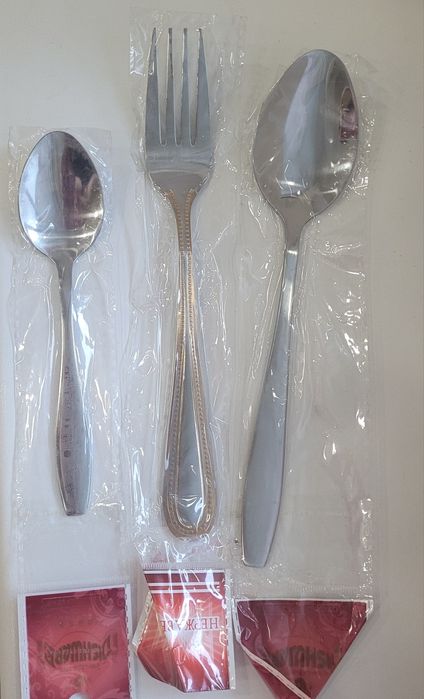 Продам столовые приборы новые