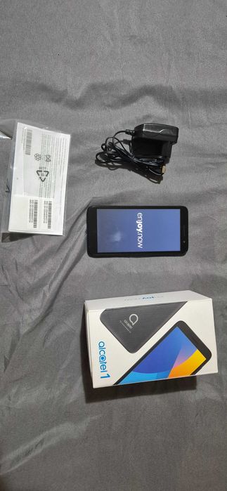 Телефон Alcatel one
