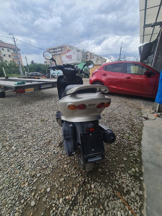 Vind scuter Yamaha 124 cmc