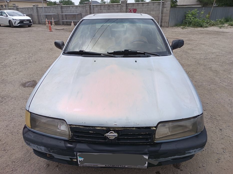Ниссан примера 1992г.