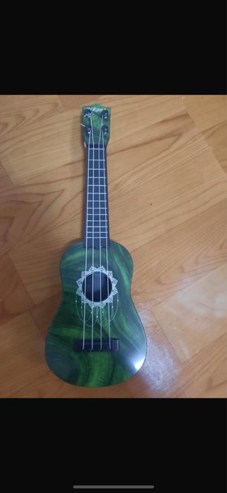 Продам укулеле новый