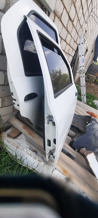 Дверь левая задняя рено логан1