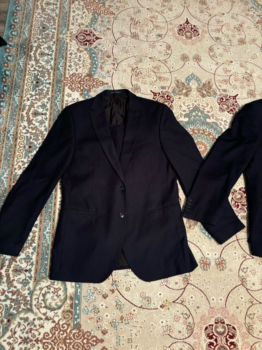 Продам костюмы синего цвета