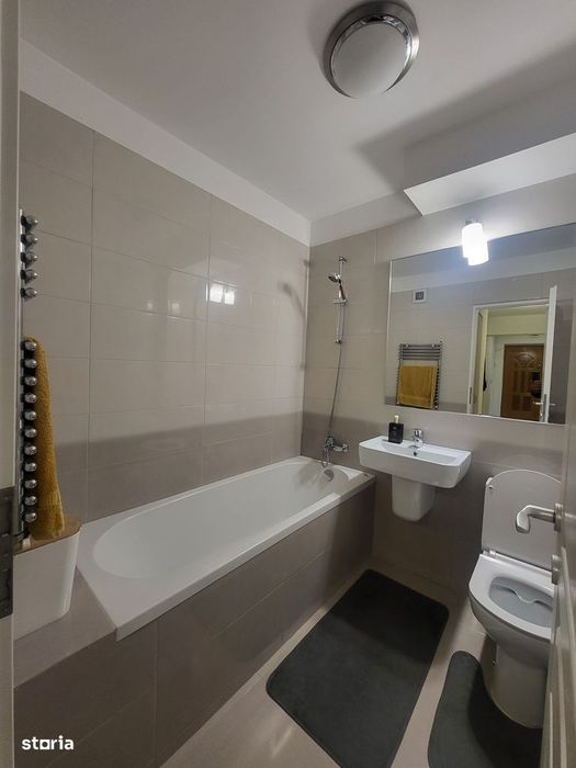 Apartament 3 camere superfinisat mobilat.