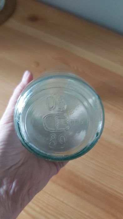 Бутылки молочные