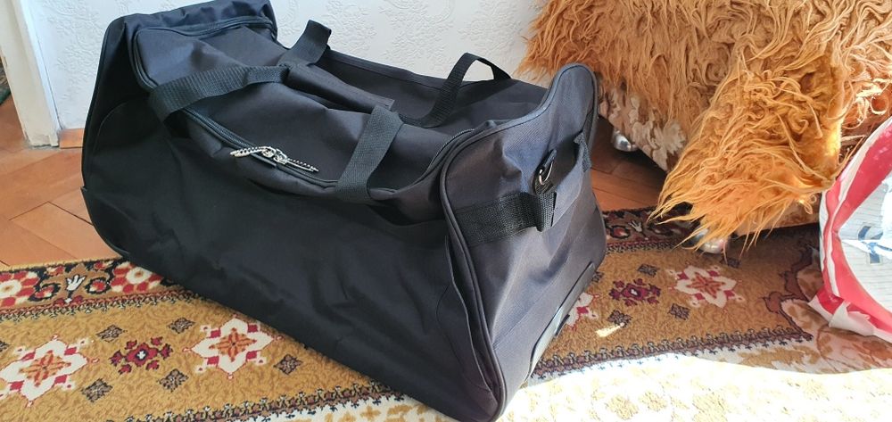 Чанта за пътуване на колела и с дръжка