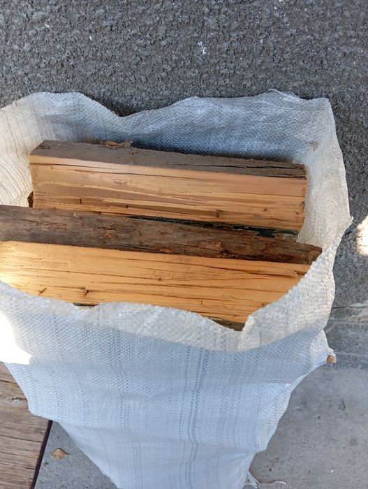 Сухие Дрова в мешках.