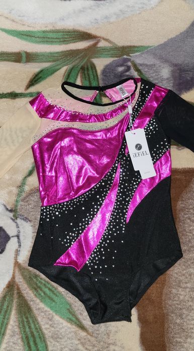 Гимнастический купальник брендовский новый