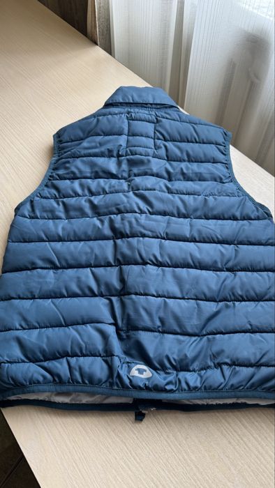 Жилет Том Тэйлор, Германия