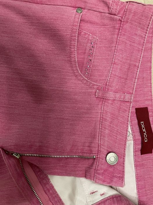 Продам джинсы розовые