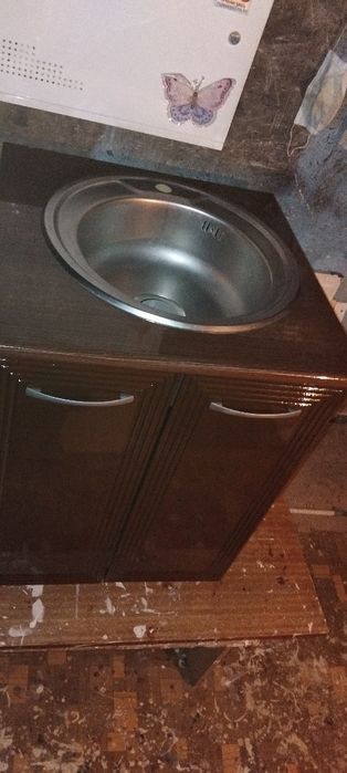 Продам кухоный мойка круглая.